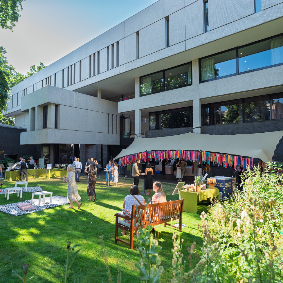 summer party at rcp london events people are sat enjoying the outdoor space
