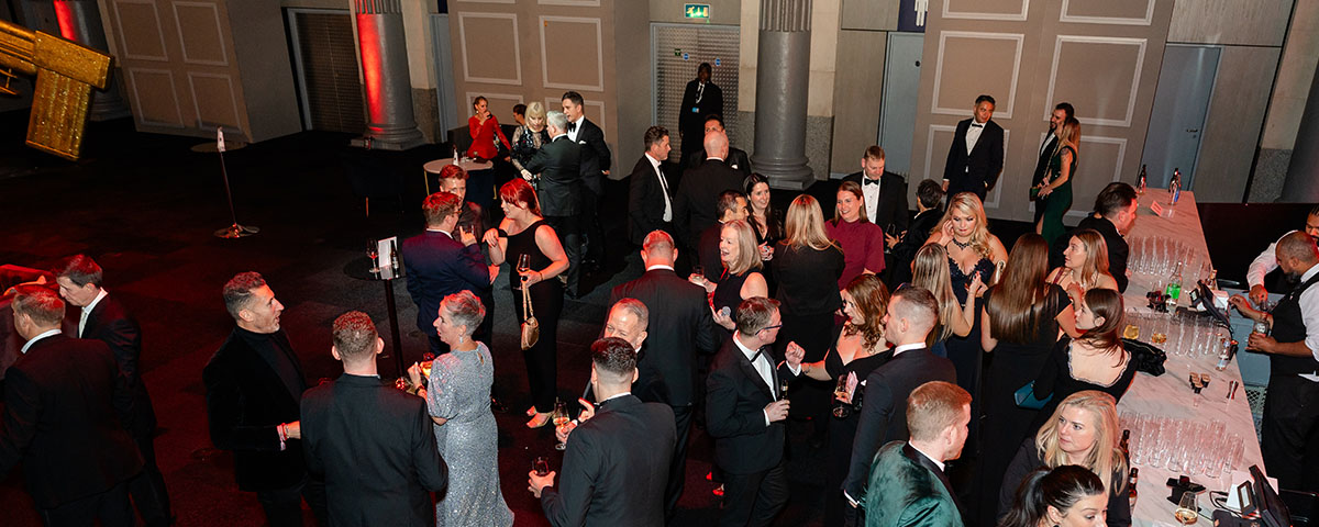a birds eye shot of people enjoying an evening gala event