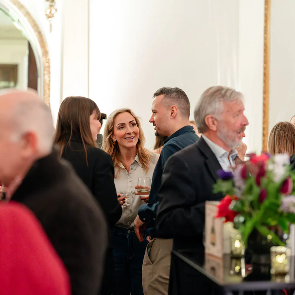 people talking at an event