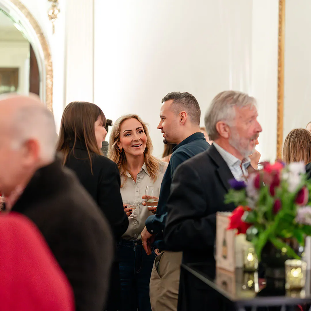 people talking at an event